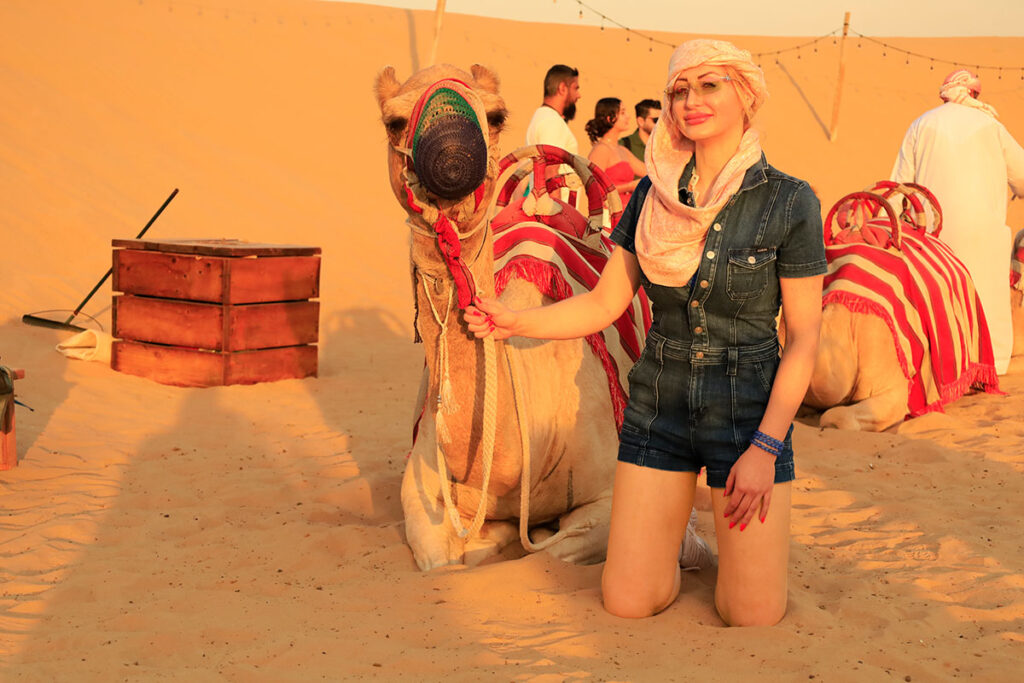 In Dubai with Joelle Monroe Independent Escort Joelle Monroe posing with a camel.